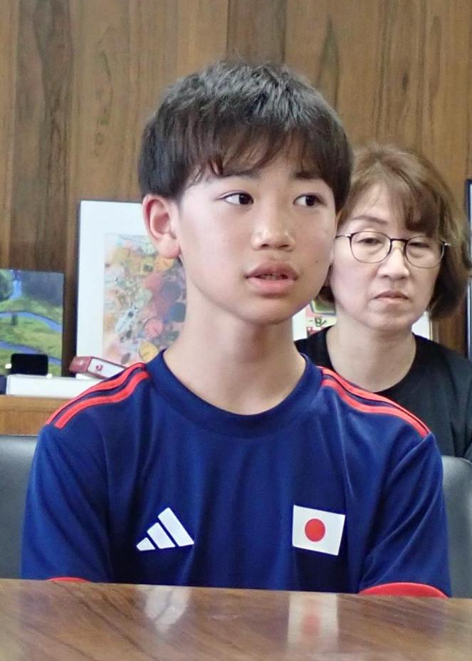 関選手