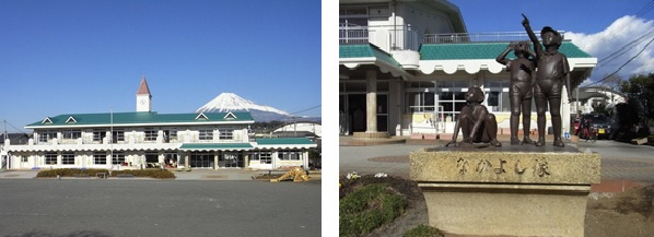 (写真)園舎となかよし像